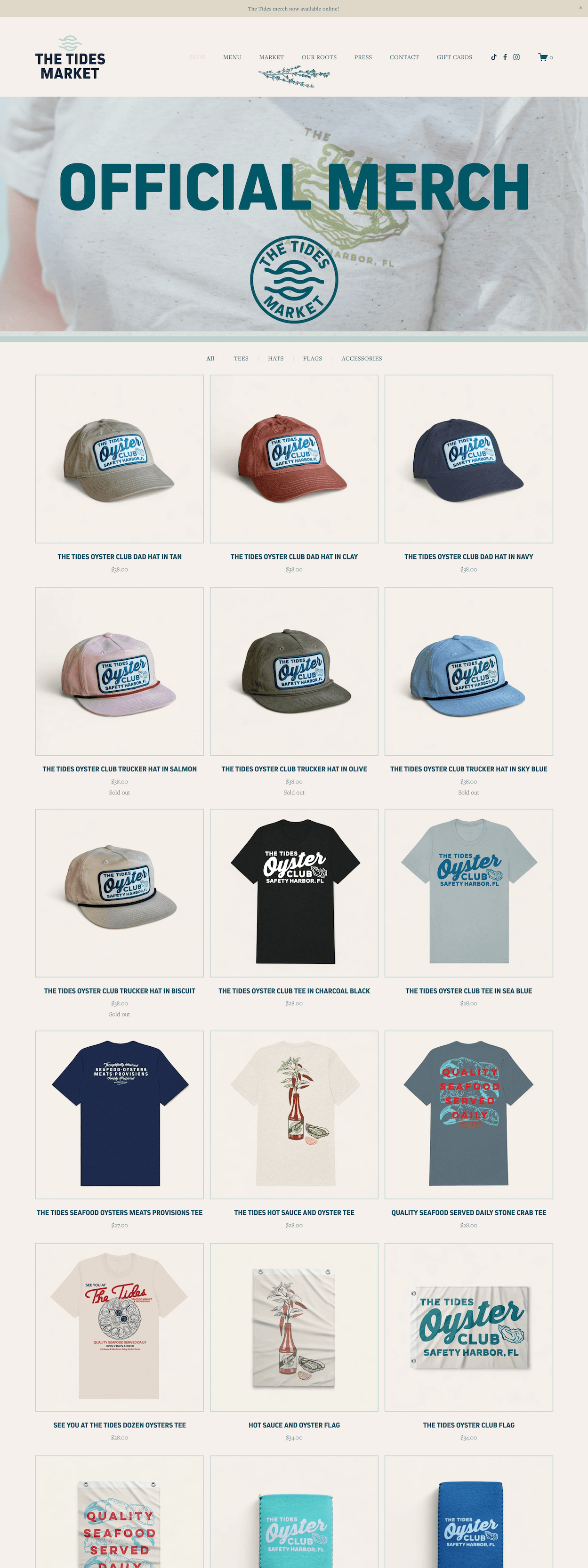 Online store webpage for The Tides Market featuring official merchandise including hats, t-shirts, and accessories with ocean-themed logos and graphics.