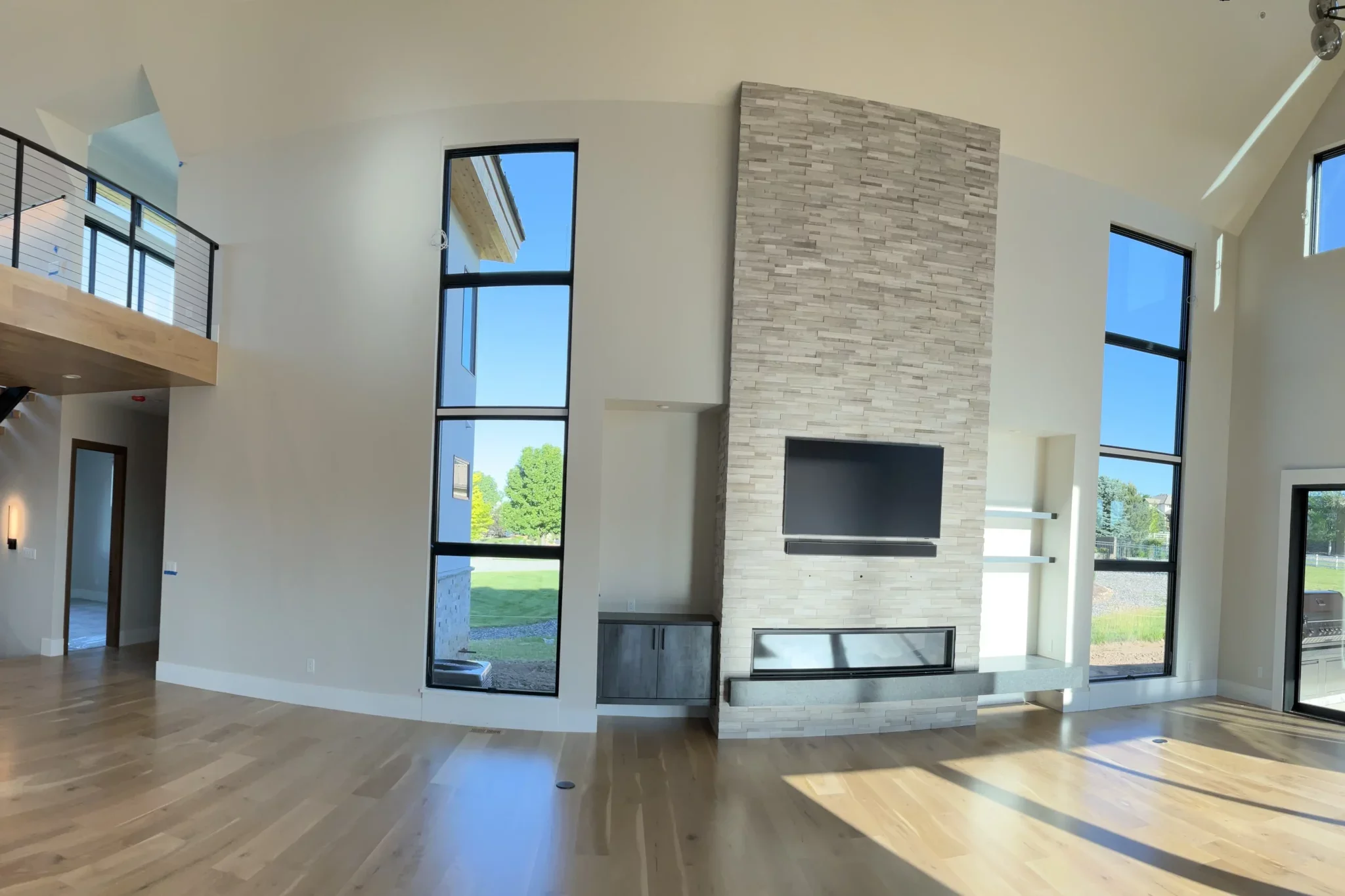 Spacious interior living area with freshly painted walls and clean finishes, representing professional residential interior wall painting.