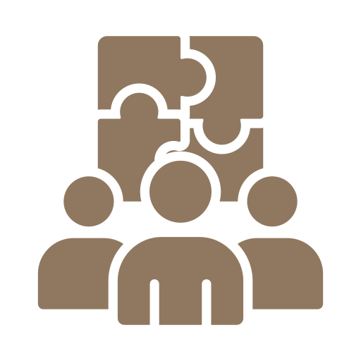 Icon of three people with puzzle pieces above their heads, representing teamwork or collaboration.