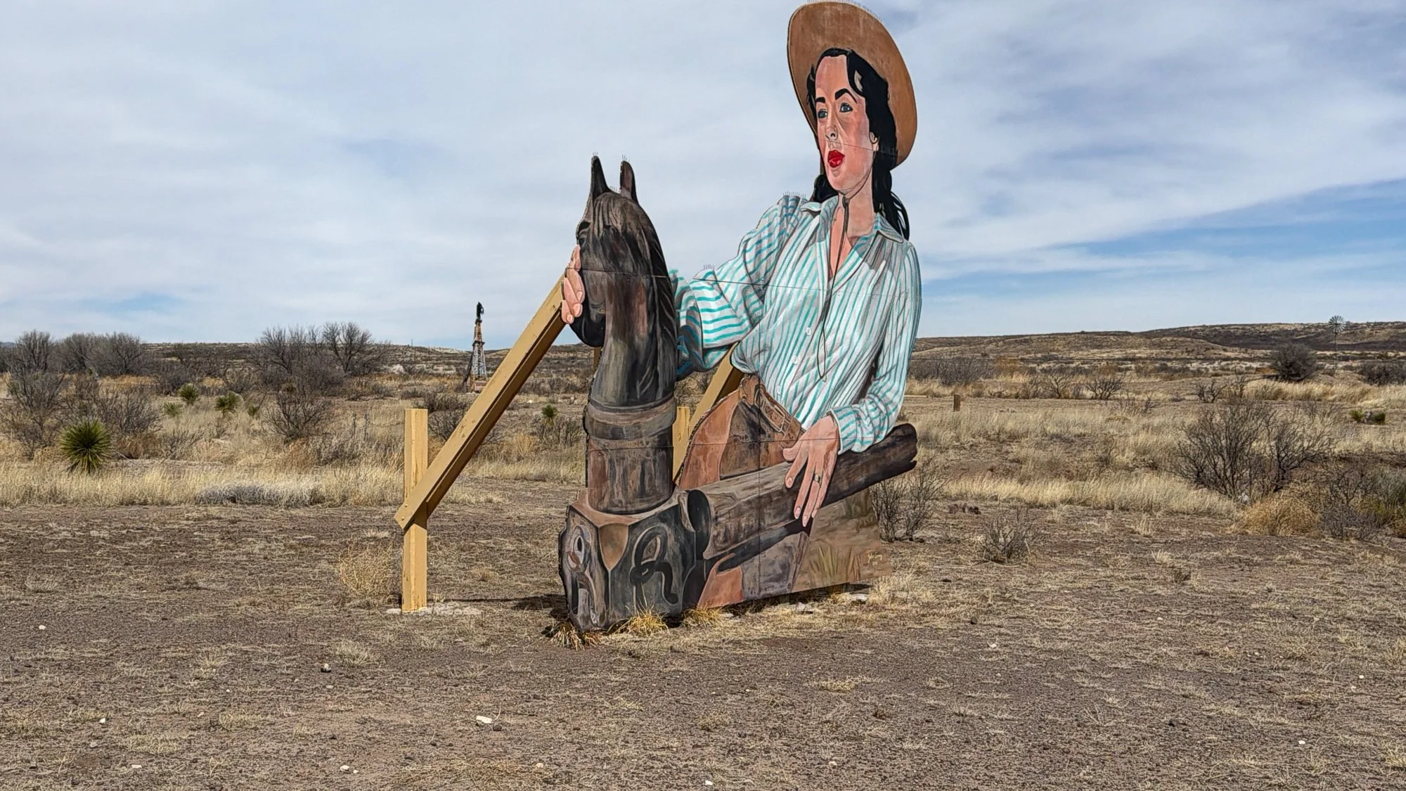 A standalone mural of a woman on a horse