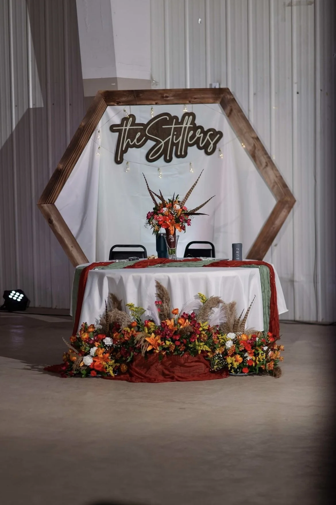 Reception flowers for sweetheart table.