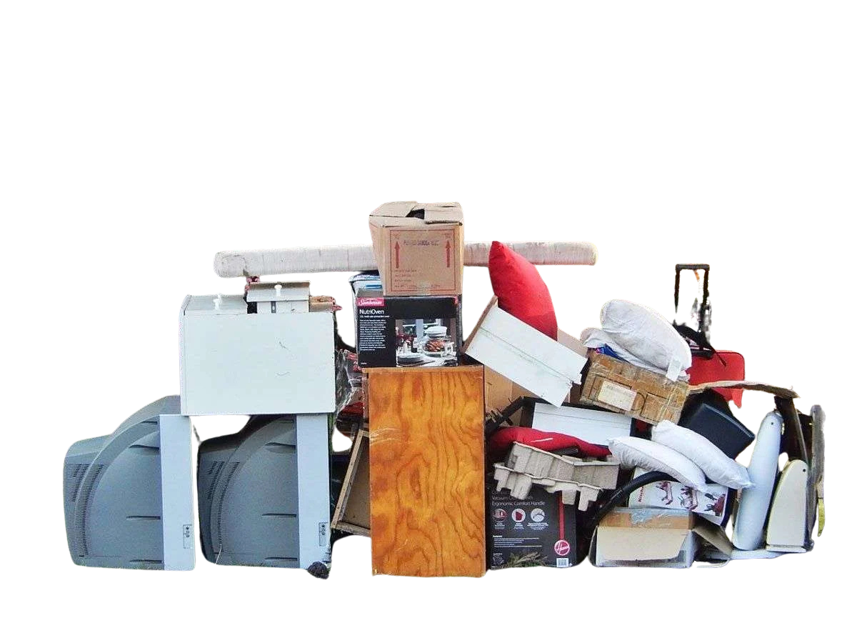 A large pile of assorted household items including boxes, paper, and appliances.