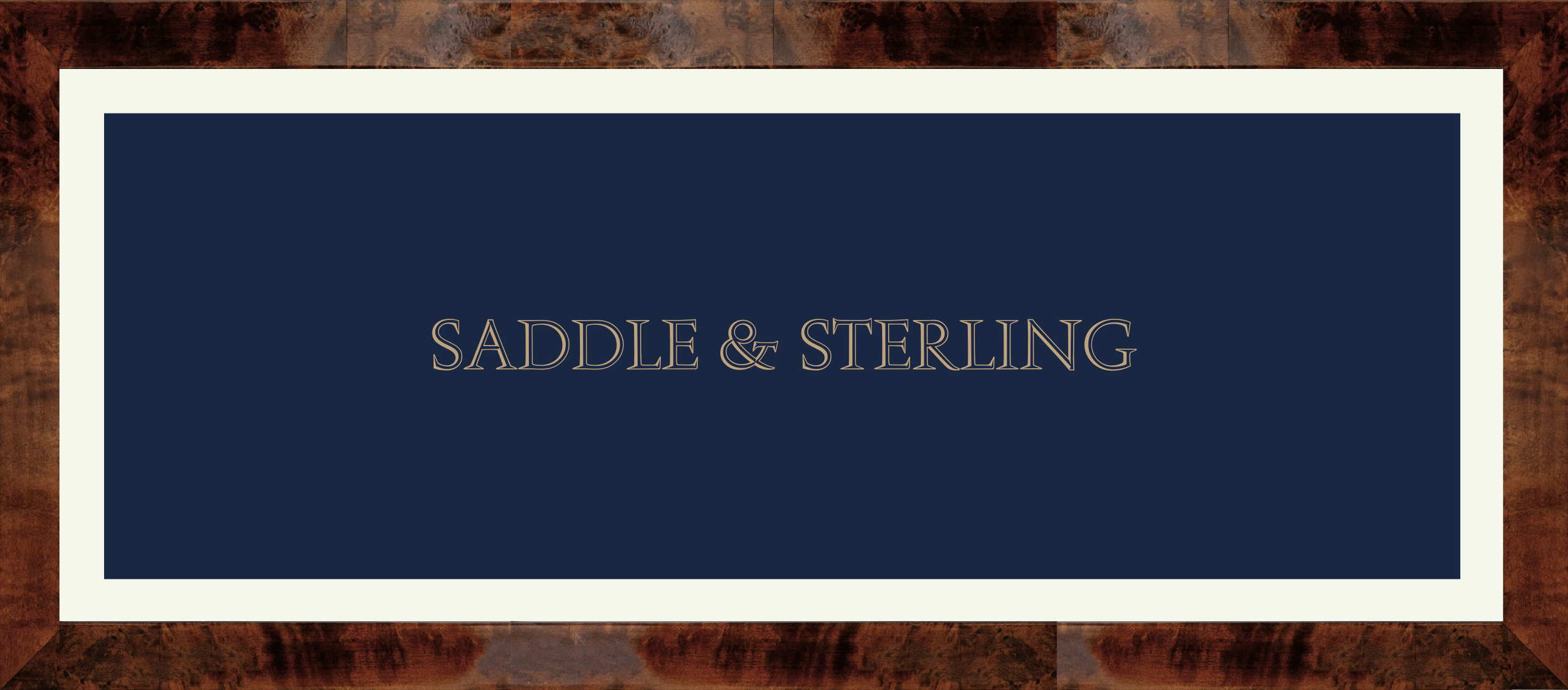 'Saddle & Sterling' logo on a navy blue background, mounted with a white border, and finished off with a burlwood frame.