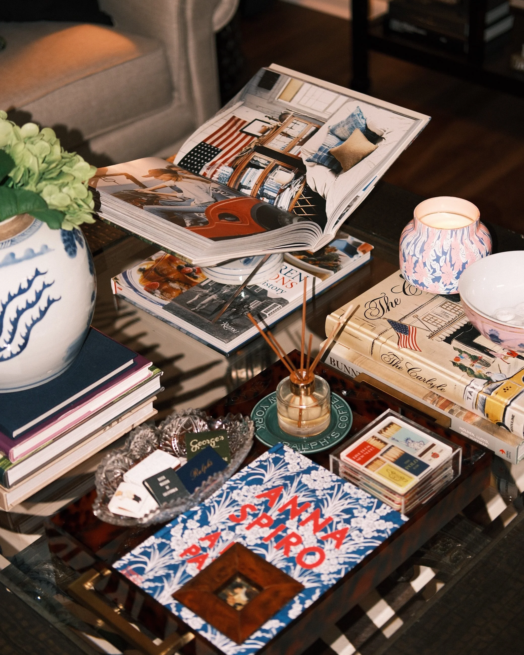 Beautifully styled coffee table designed by Saddle and Sterling. Saddle and Sterling is a Interior Design, Event Planning, Seasonal and Holiday decorating business in Arkansas. Serving Arkansas and beyond.