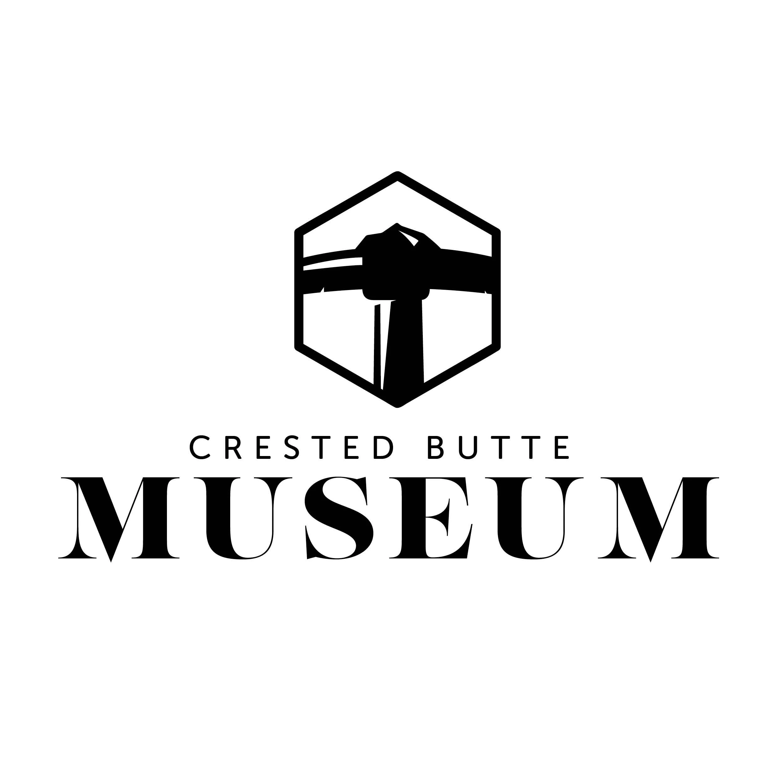Black and white logo for Crested Butte Museum with a mountain cabin inside a hexagon and a truck underneath, and the text "Crested Butte Museum" below.