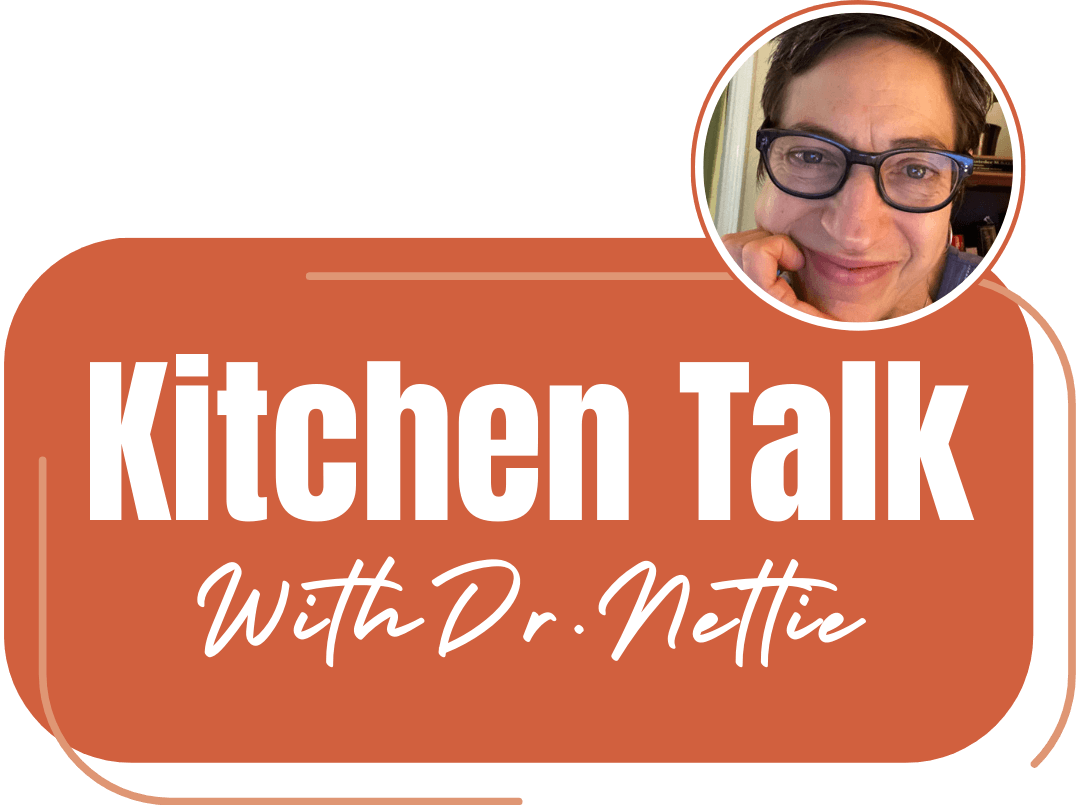 Logo for Kitchen Talk with Dr. Nettie featuring Dr. Annette Sacksteder of Vibrant Naturopathic Care wearing glasses and resting her chin in her hand with a smile on her face.