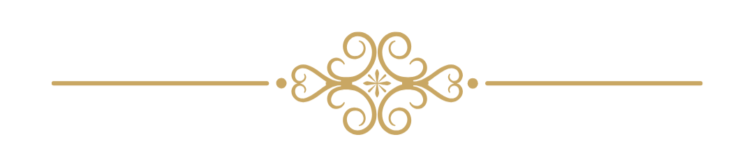 Decorative gold and black ornate divider with symmetrical swirl design in the center.