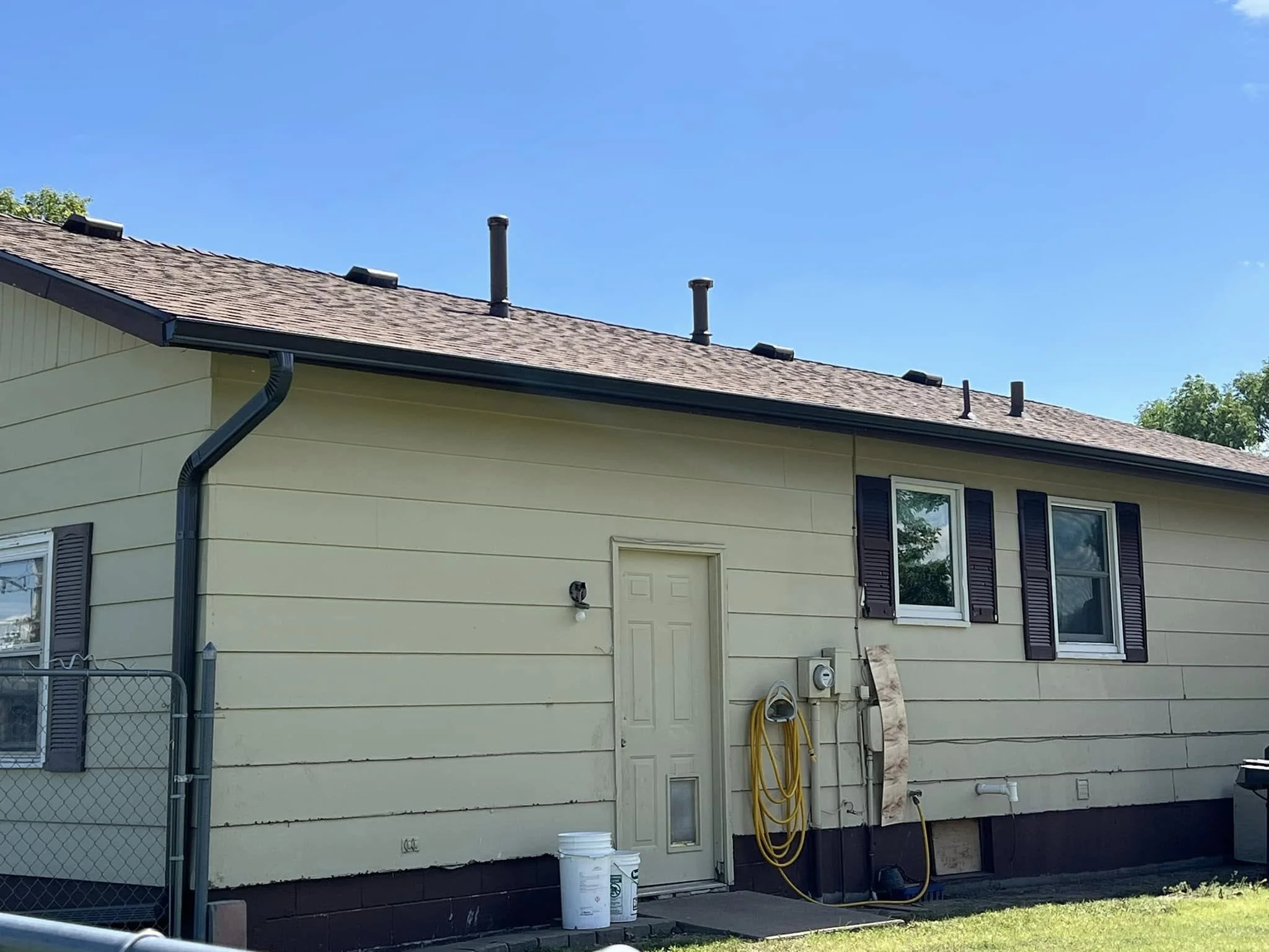 Brown Gutter and Downspout Replacement