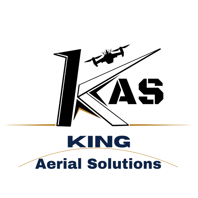 Logo for King Aerial Solutions featuring a large stylized 'K' with an airplane silhouette flying above, and the words 'KING Aerial Solutions' below in dark blue letters.