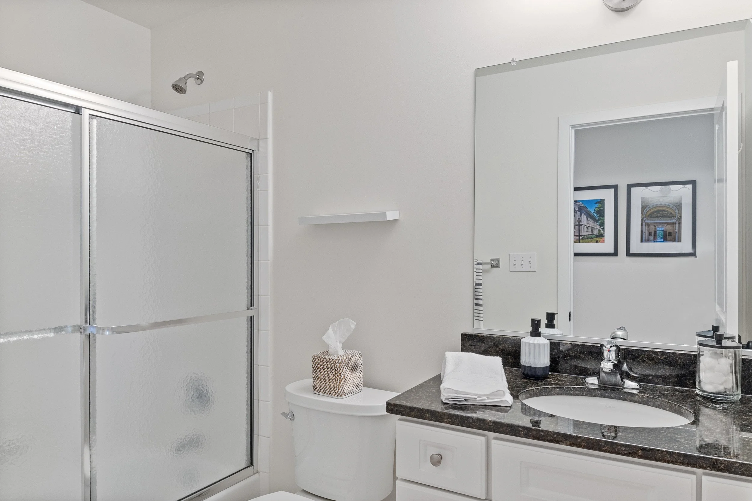 2nd guest bathroom with tub, shower and vanity.jpg