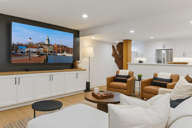 basesment family room with Annapolis City Dock on TV.png
