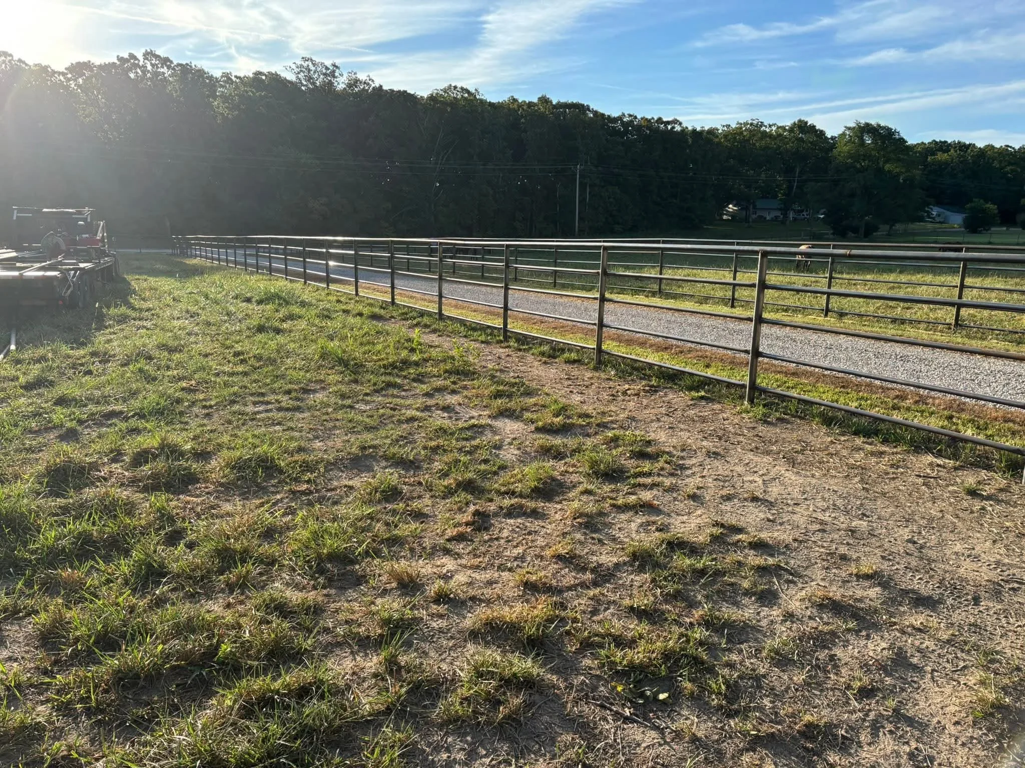 Finished fenced in drive way