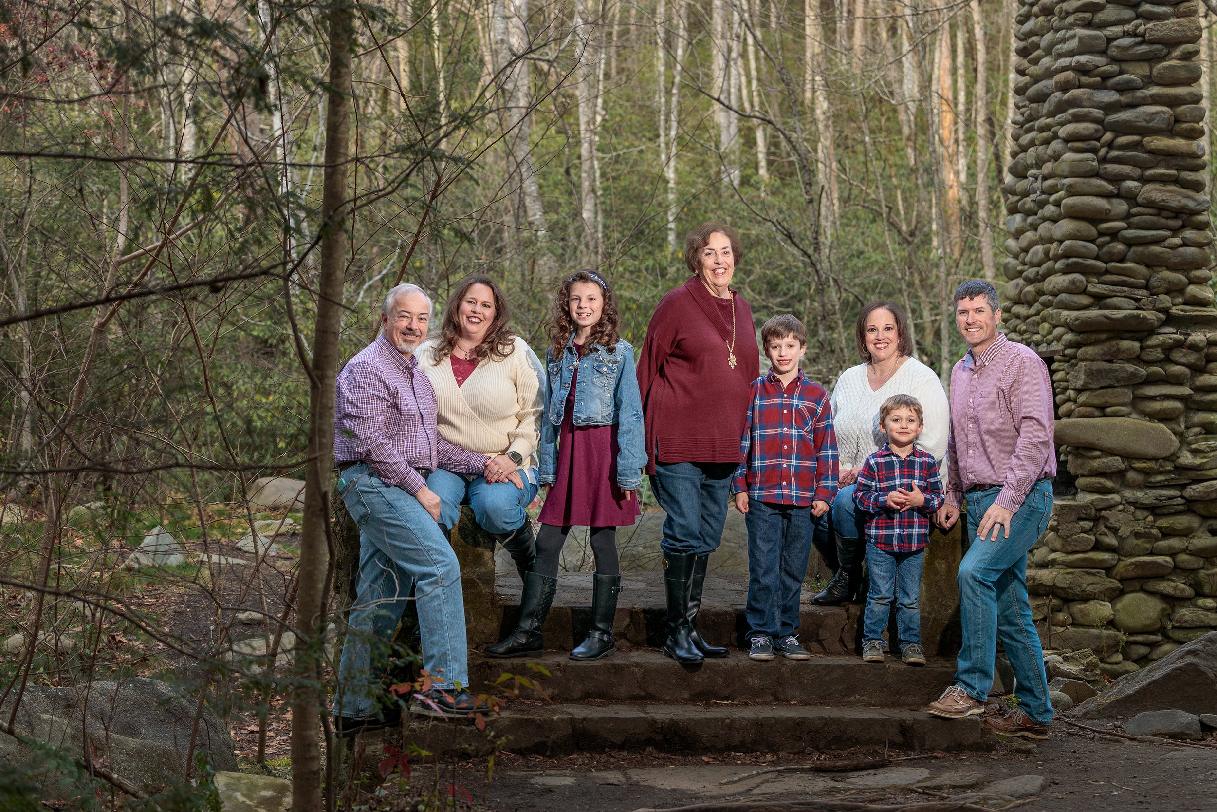 An extended family poses happily for a picture taken in the Great Smoky Mountains Naitonal Park