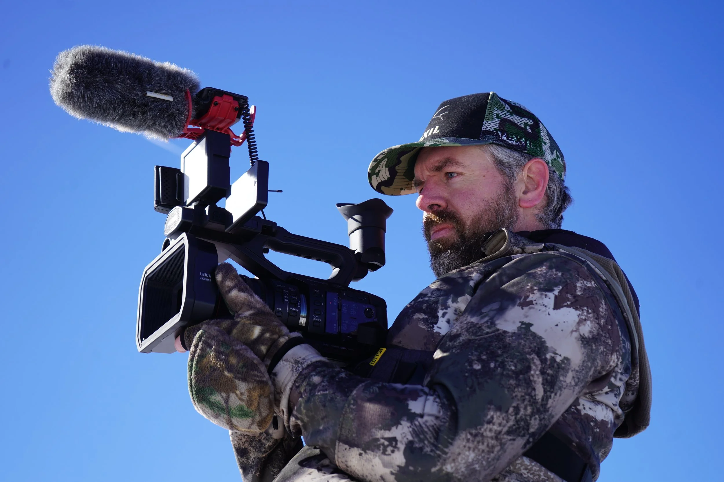 Loren filming mule deer on a cold winter morning