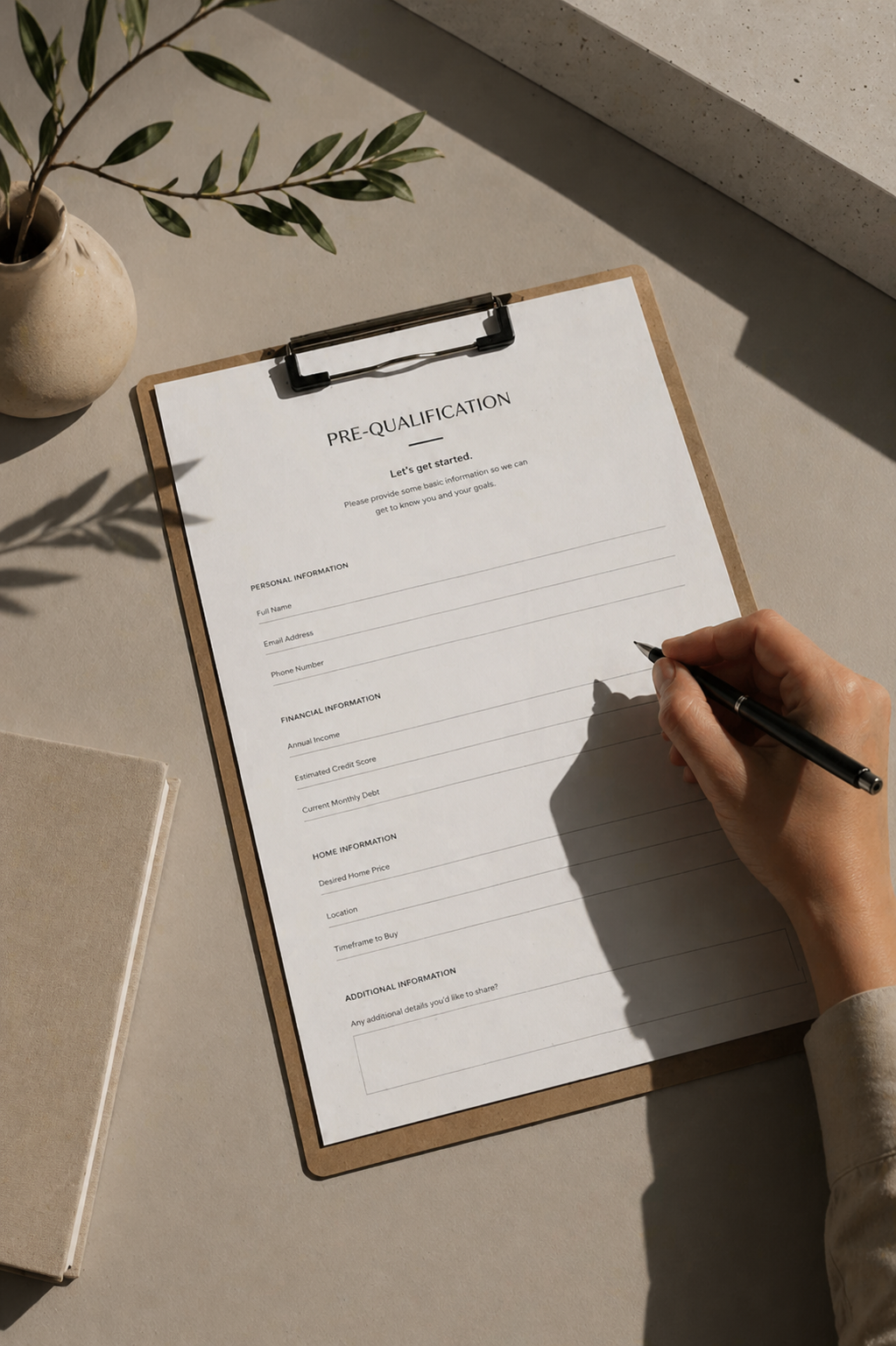 A person filling out a pre-qualification form on a clipboard