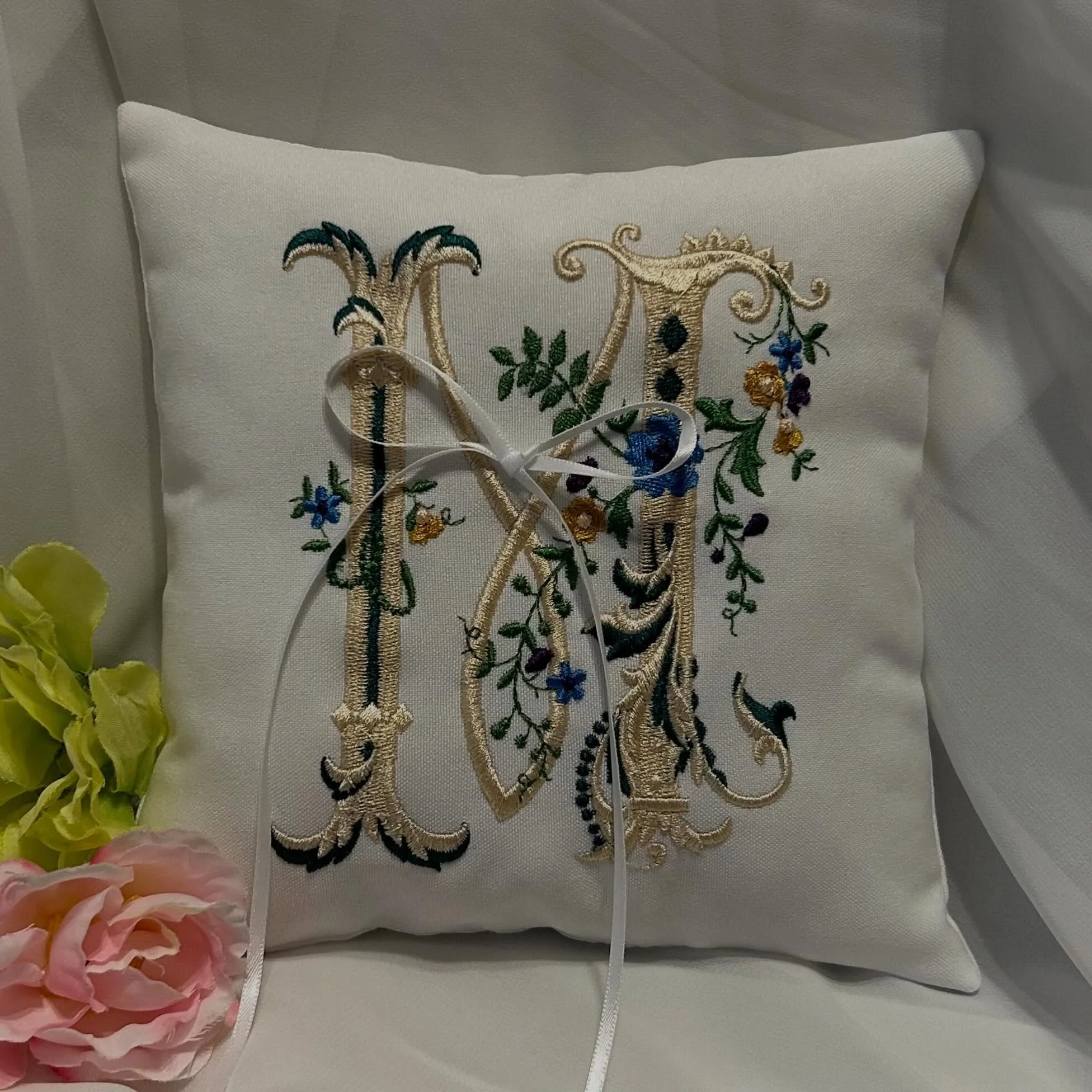 A beautiful keepsake for one of life&rsquo;s most special moments 💍✨ Our custom embroidered ring pillows are a timeless piece to cherish long after the big day. Ready to design yours? Visit our website to explore customization options and place your