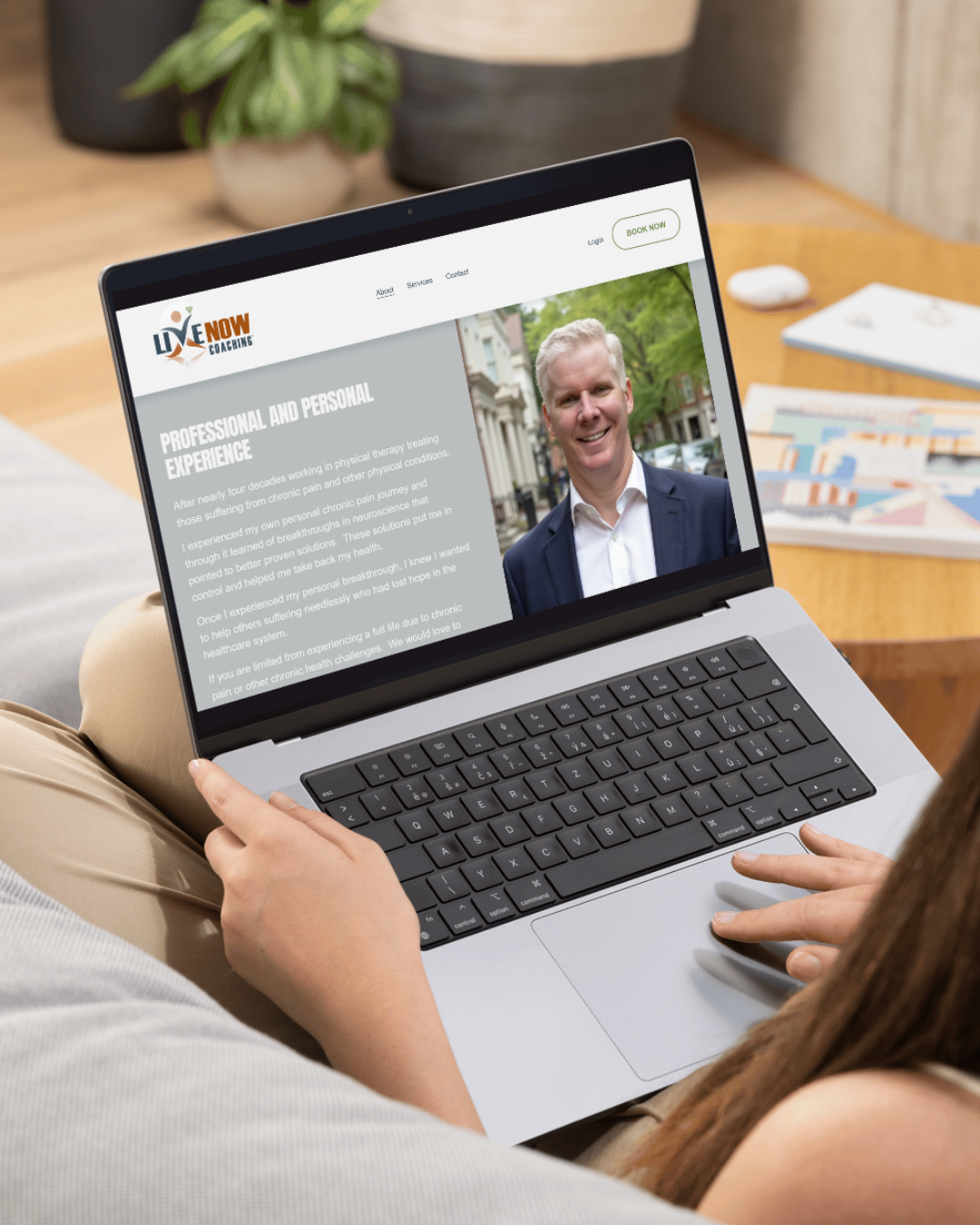 Client on laptop viewing Live Now Coaching website