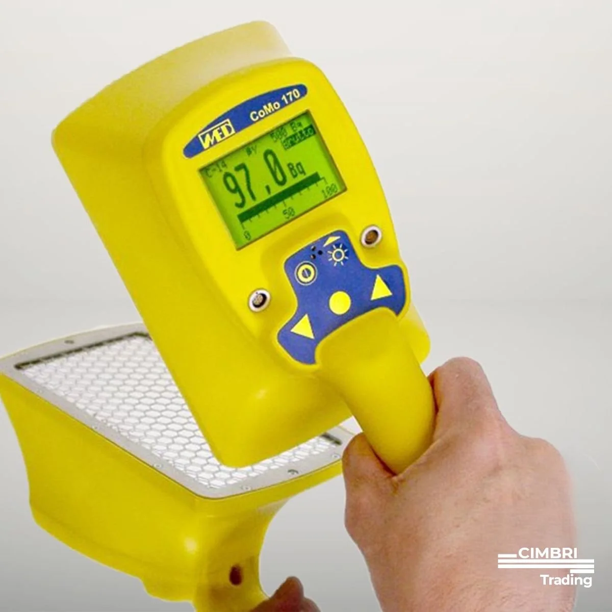 A yellow radiation detector showing a reading of 97.0 microsieverts per hour