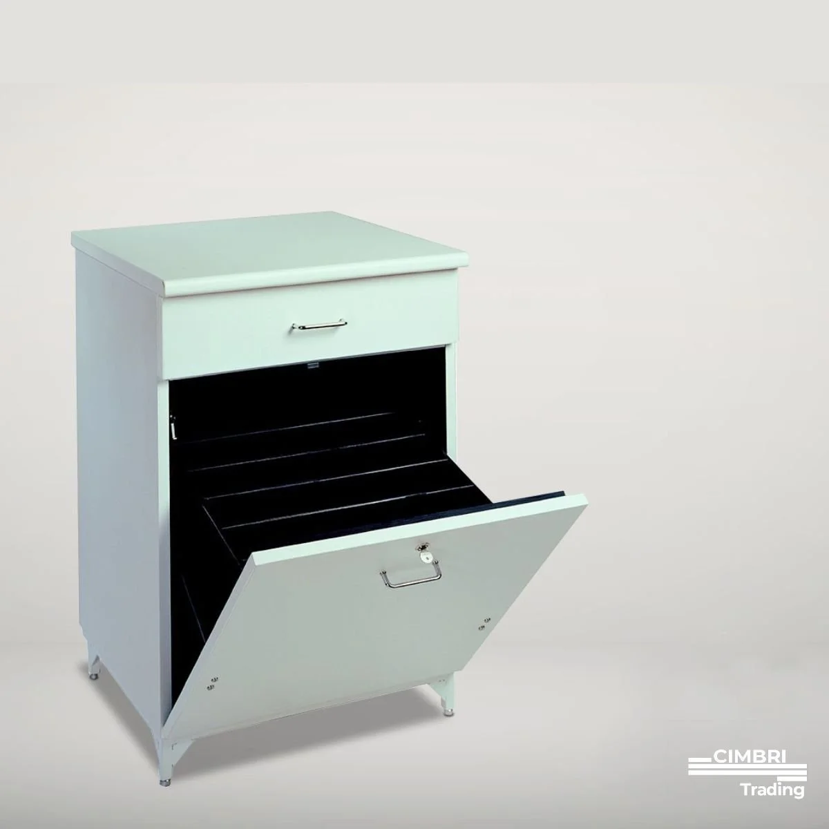 A white cabinet with a curved top, a small drawer, and a large open door revealing an interior with black shelves. The cabinet has metal handles and stands on small legs. The background is plain and light-colored.