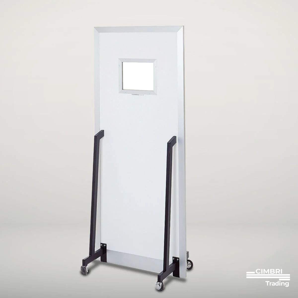 A white voting booth on wheels with a small window at the top and black handles on the sides, set against a plain light-colored background.