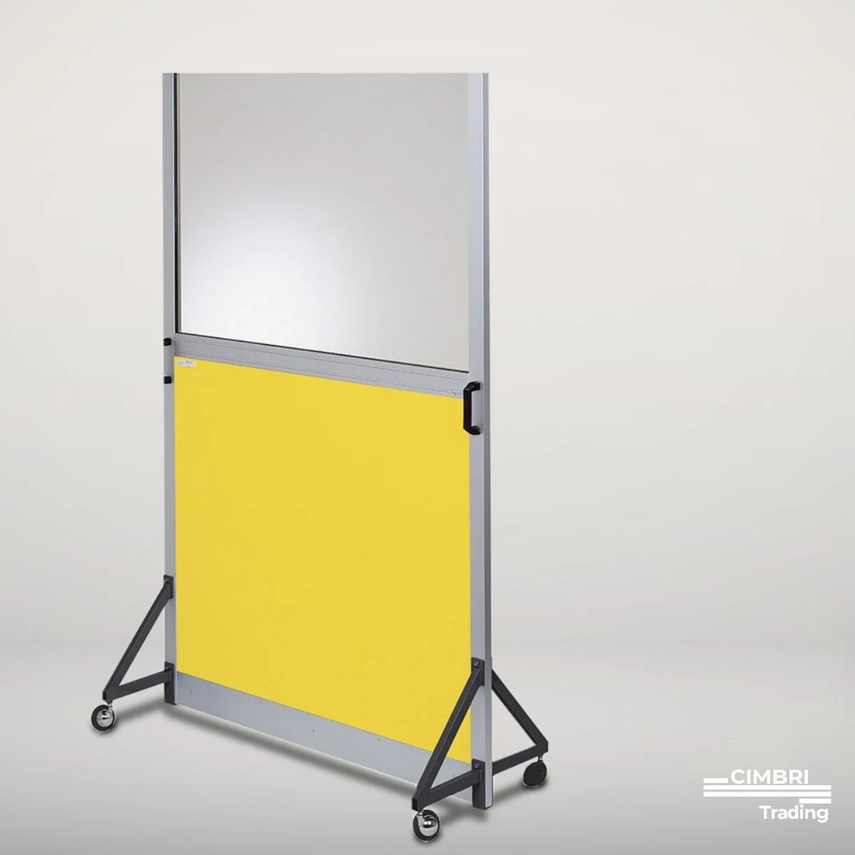 A mobile whiteboard with a silver frame, featuring a white surface on top and a yellow panel on the bottom, standing on a gray floor against a plain white background.