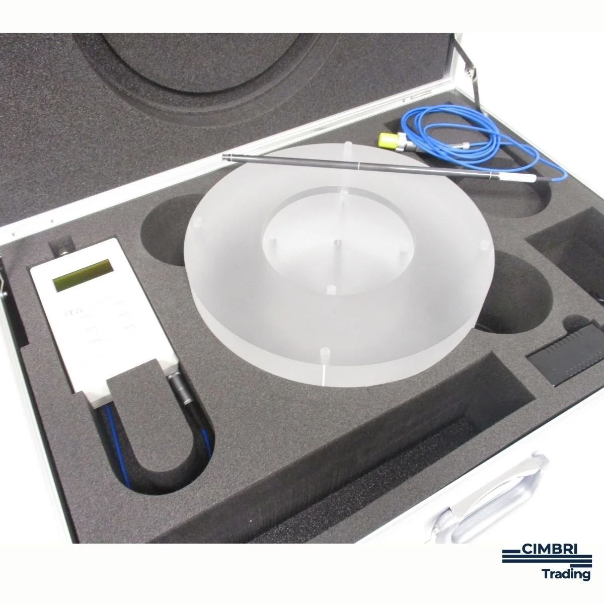 Laboratory equipment case with a digital meter, a white circular container, a blue cable, and a metal probe, used for scientific testing or calibration.