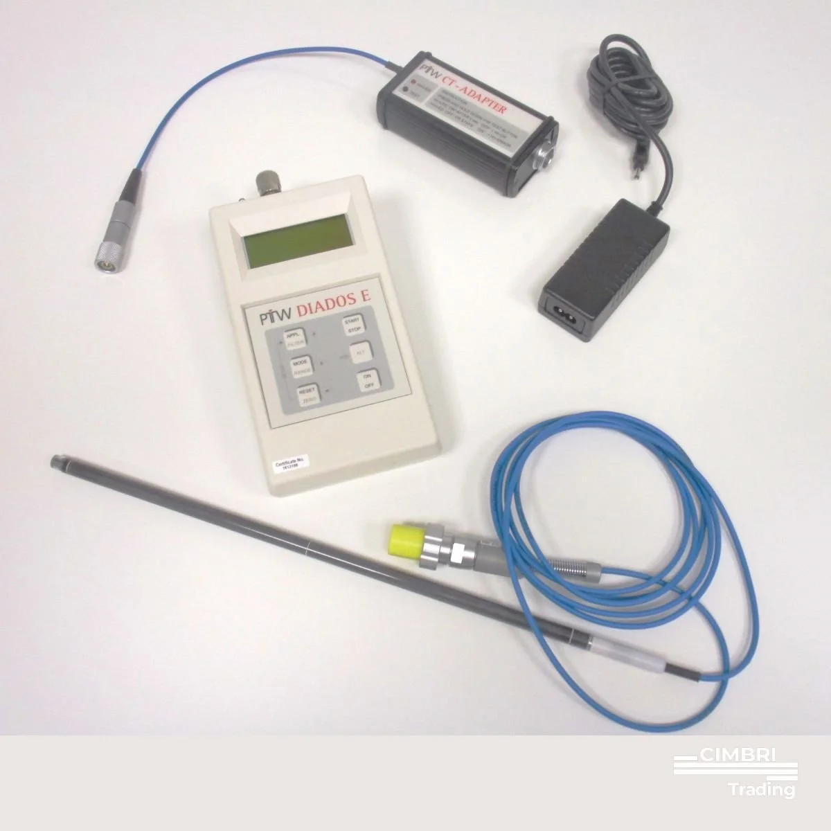 Medical monitoring device with cables, a probe, a power adapter, and a battery.