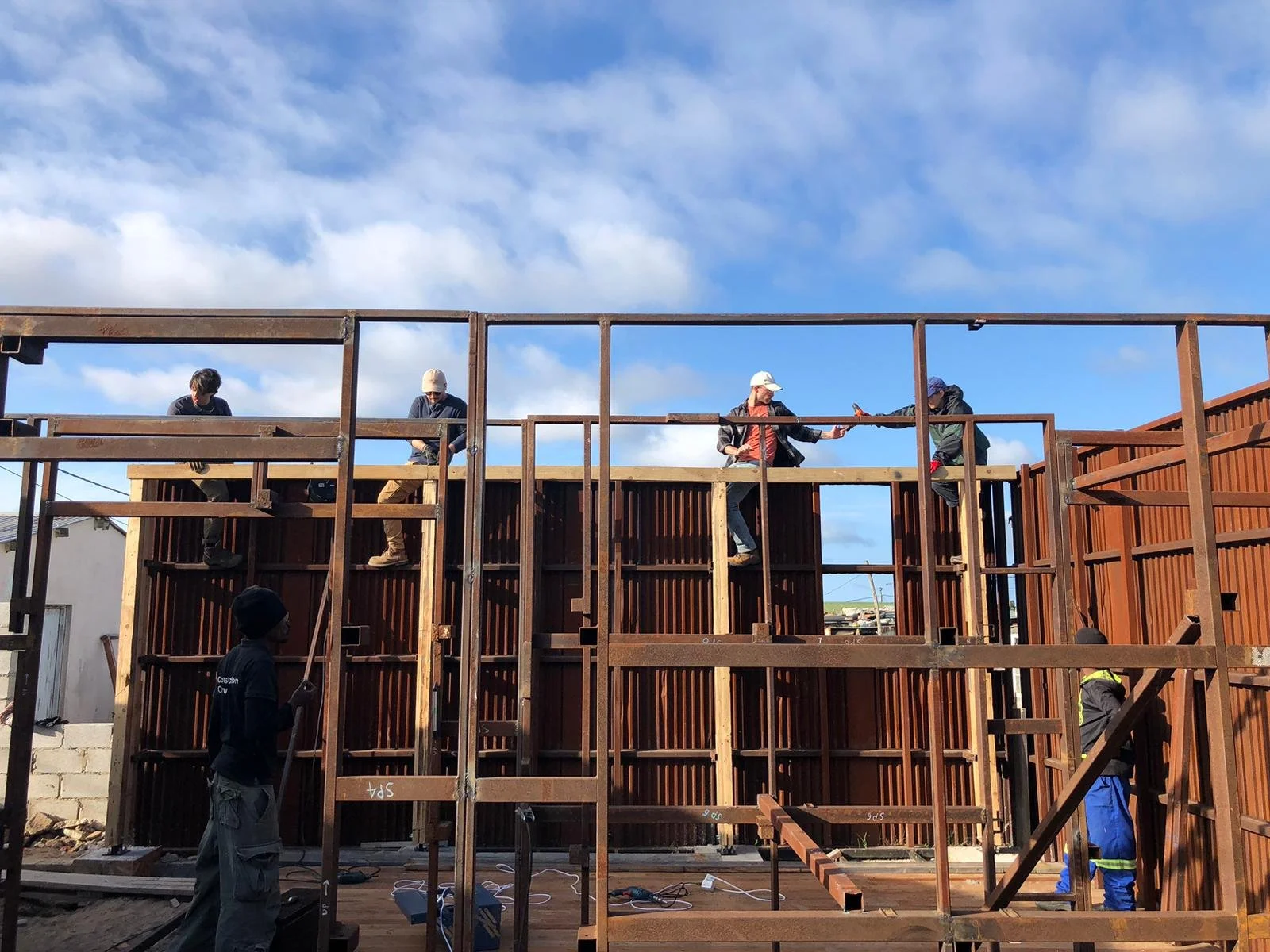Volunteers working on Penguin Play and Learn educational Center