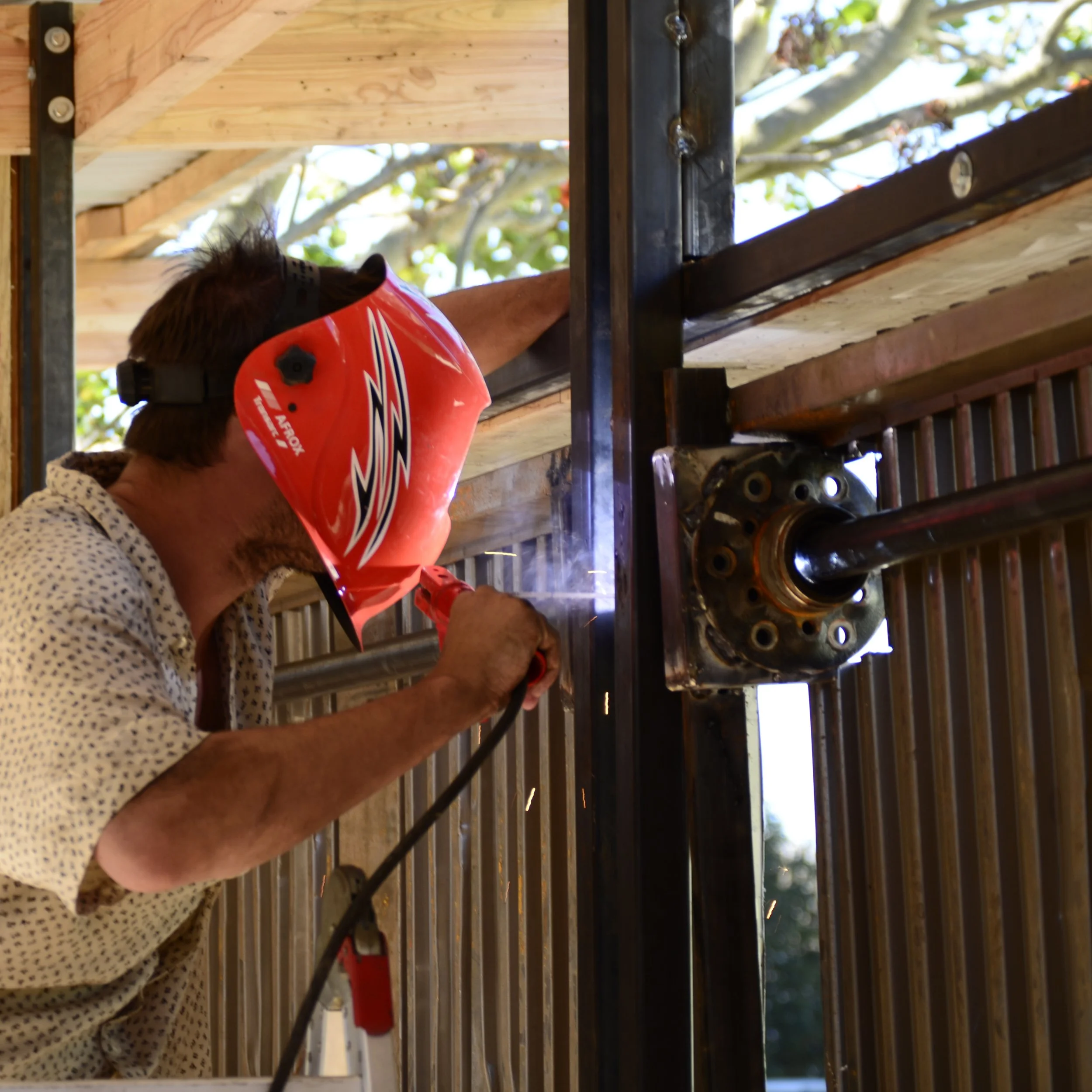 volunteer worker working on maker space project