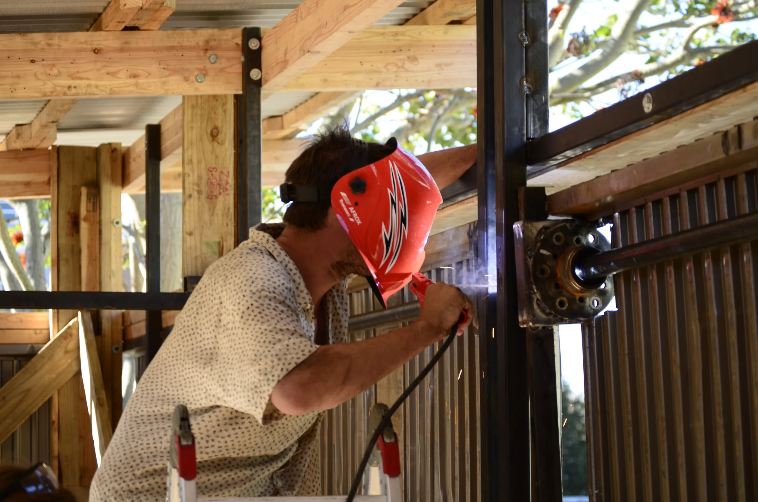 volunteer worker working on maker space project