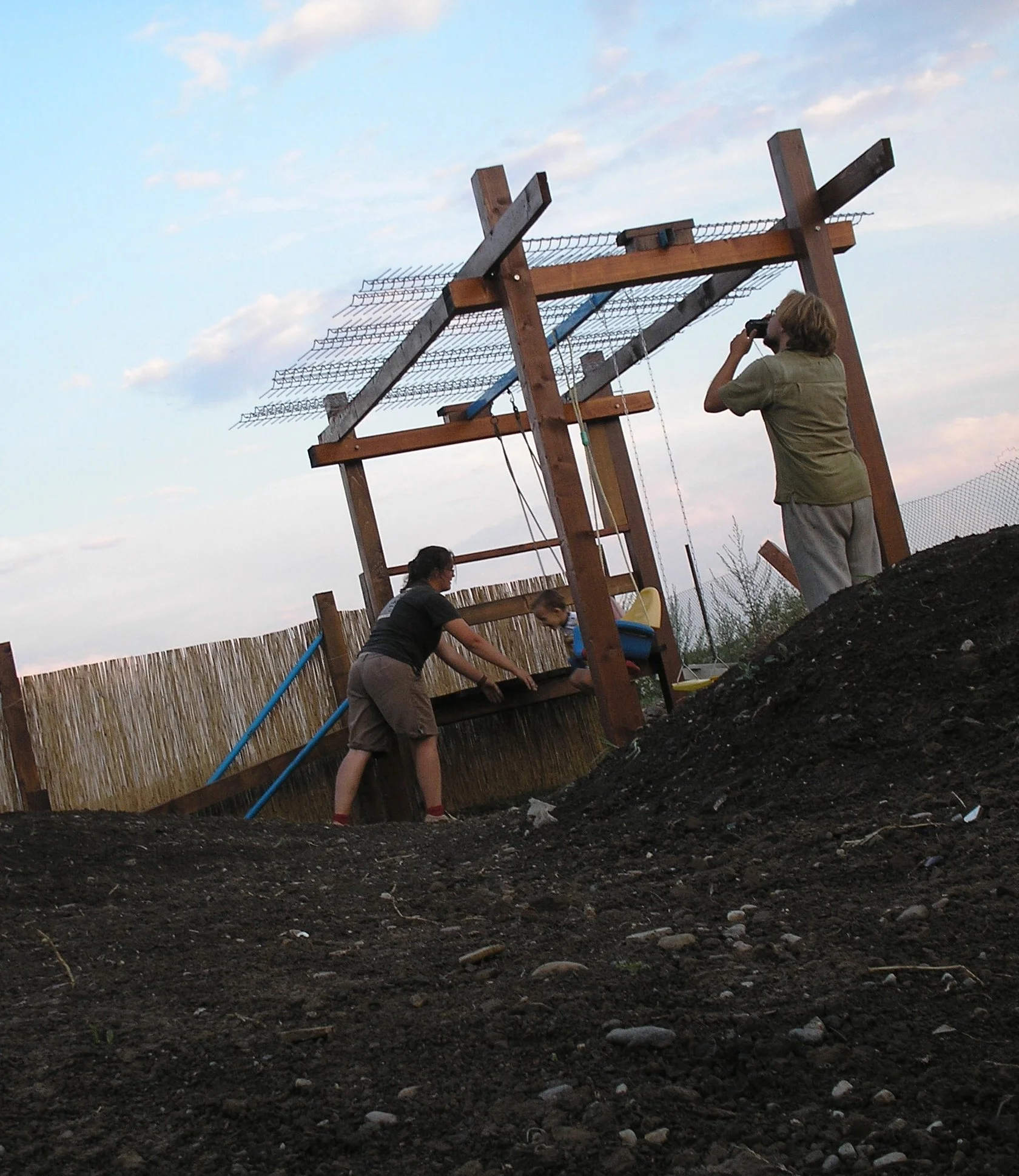 volunteers working on communal play project