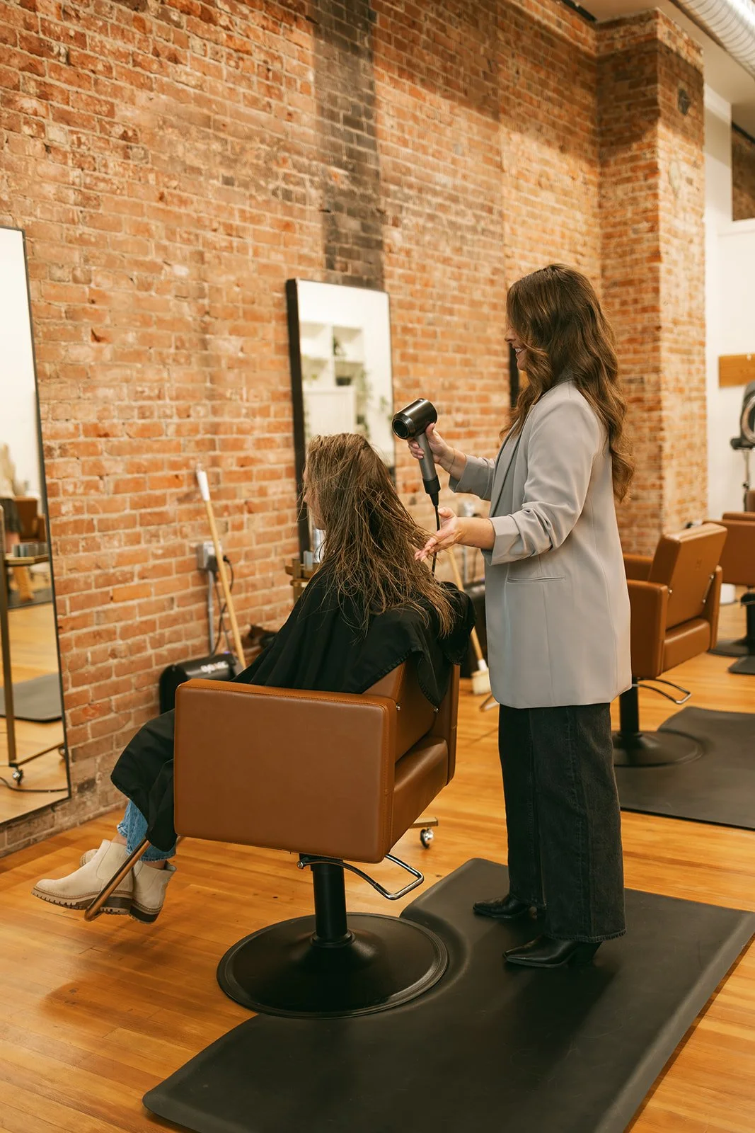 Welcoming modern salon space and team by SYMMETRIE  in Downtown Lynden, Washington