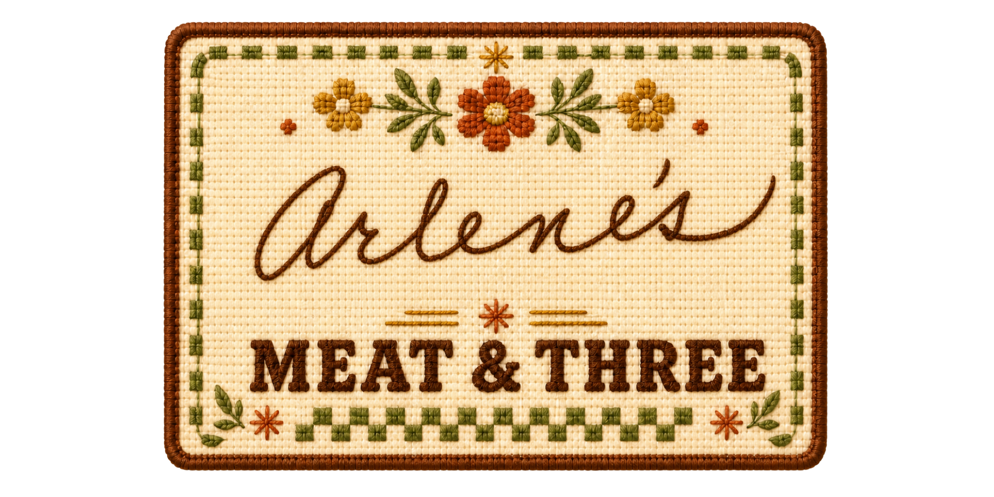 Decorative sign with embroidered floral border, the word "Alfene's" in cursive, and the words "Meat & Three" below.