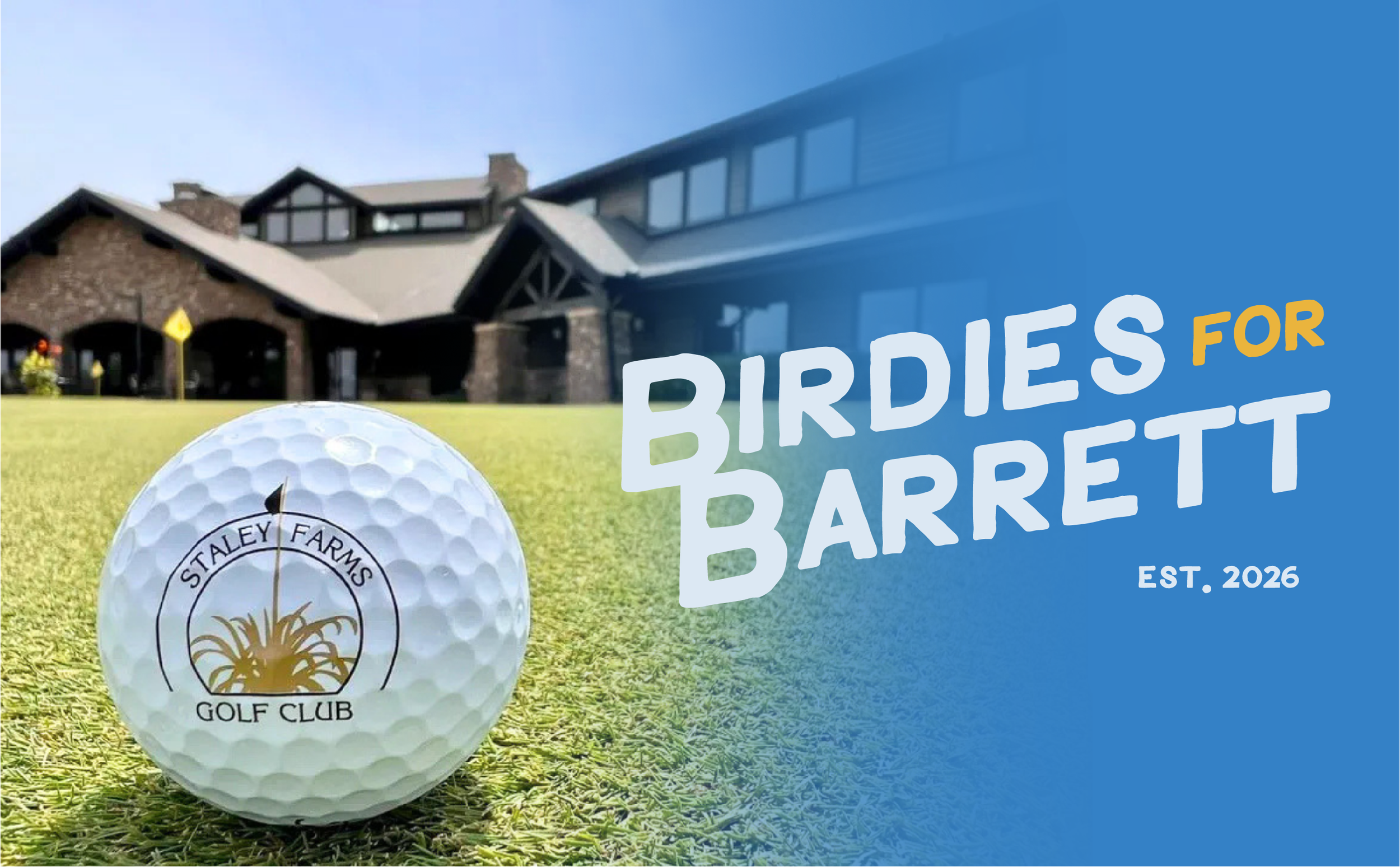 A golf ball with the logo of Staley Farms Golf Club on a green golf course, with a building in the background and blue sky.