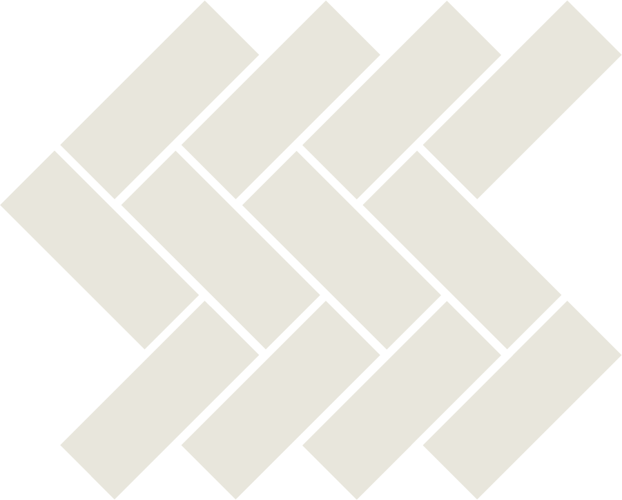 Close-up of a woven pattern of light gray rectangular tiles on a black background.