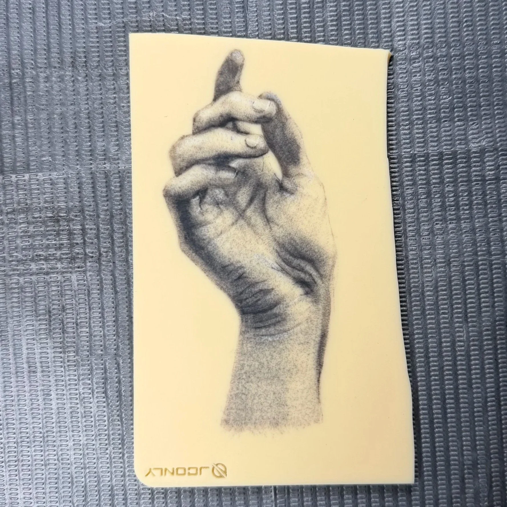 Hand study, tattoo on fake skin.