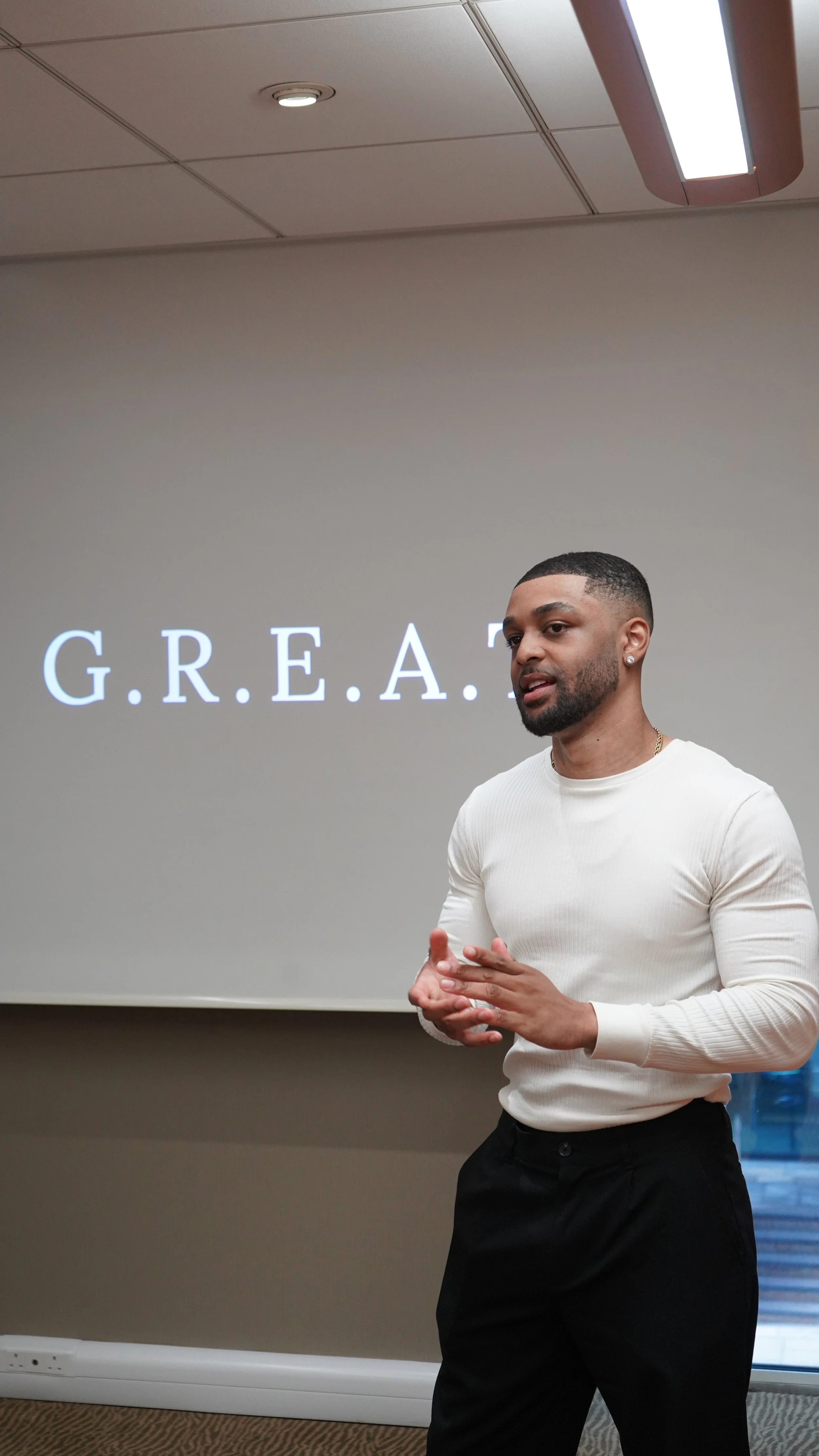 Stefan Saunders Speaking in front of a workshop group
