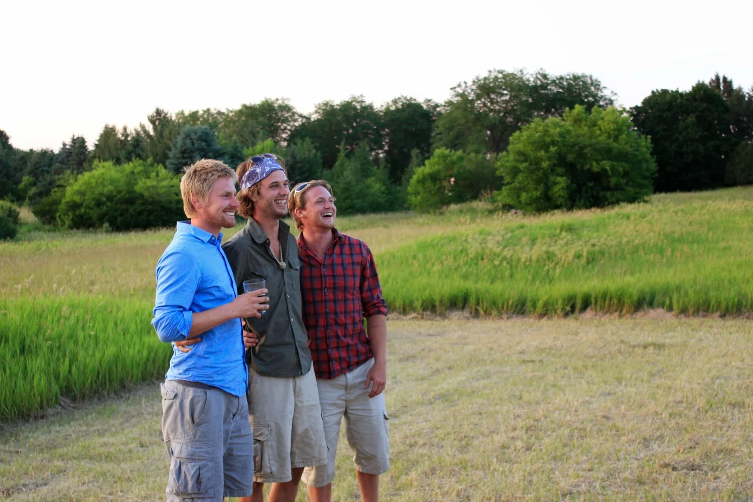 Vitruvian Team in a field smiling