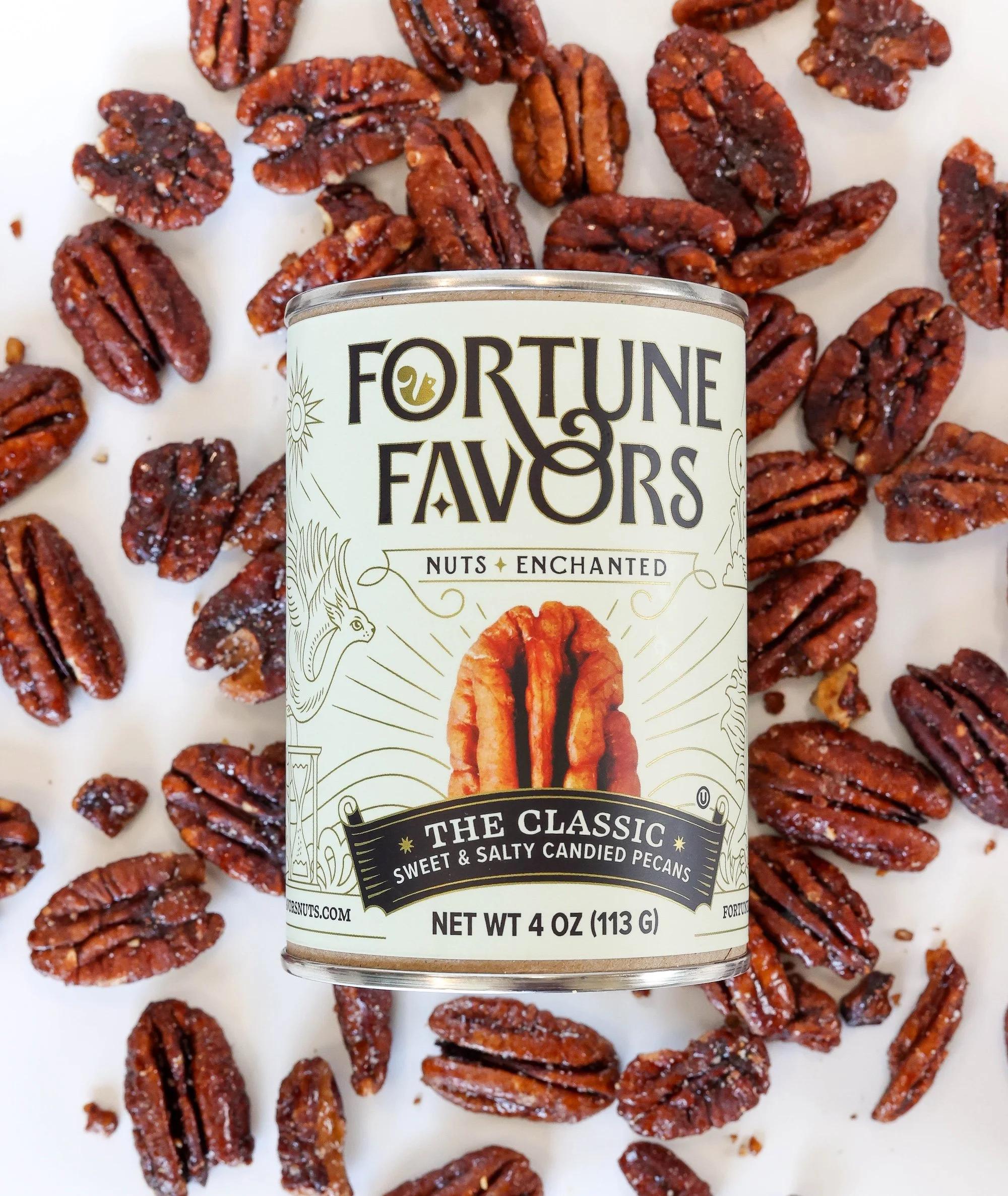 Fortune Favors Original Pecans on a white table with a can of nuts above it