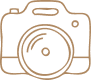 Illustration of a DSLR camera with a lens.