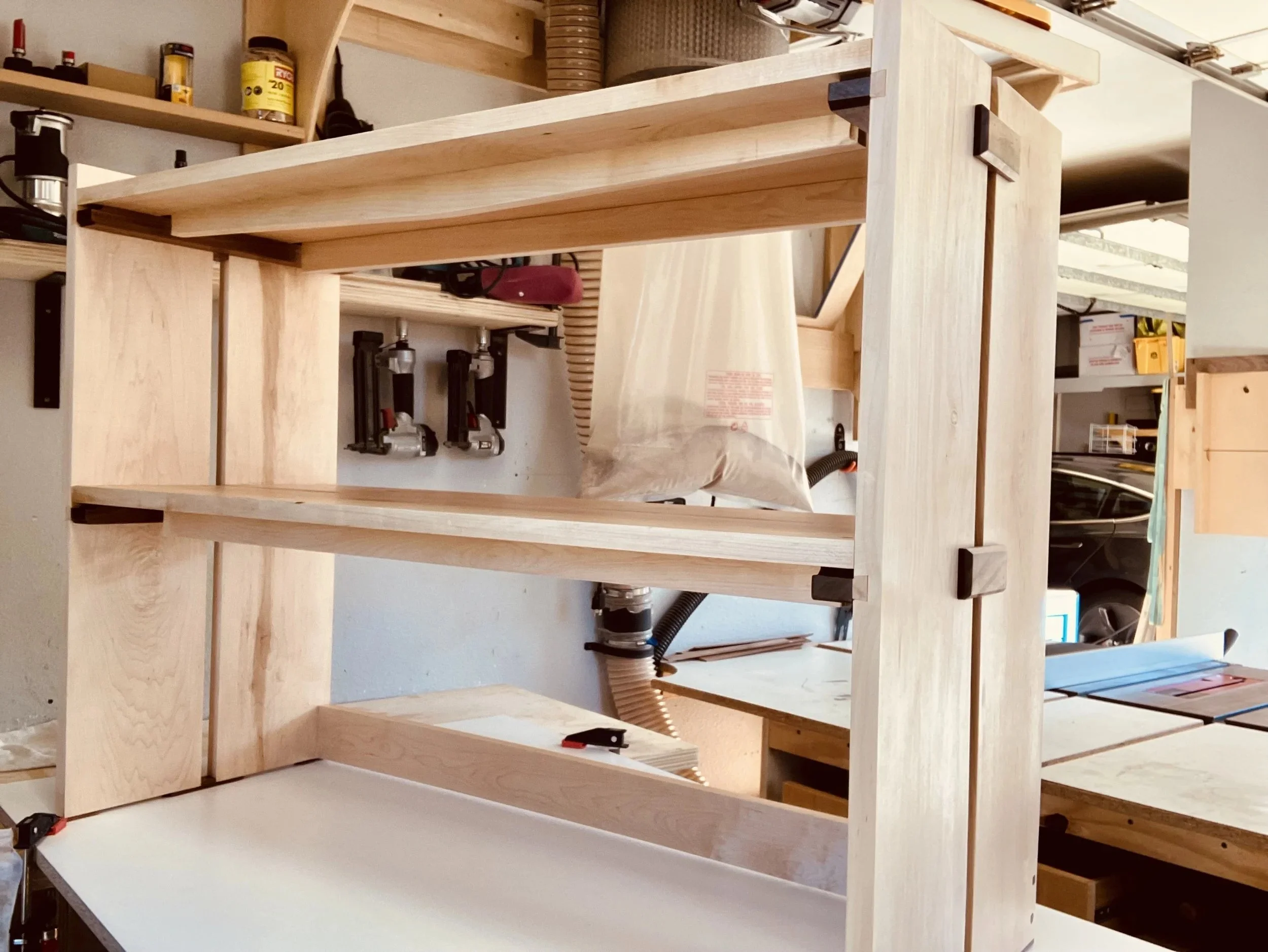 maple shelf with walnut joinery fixtures using sashimono methods