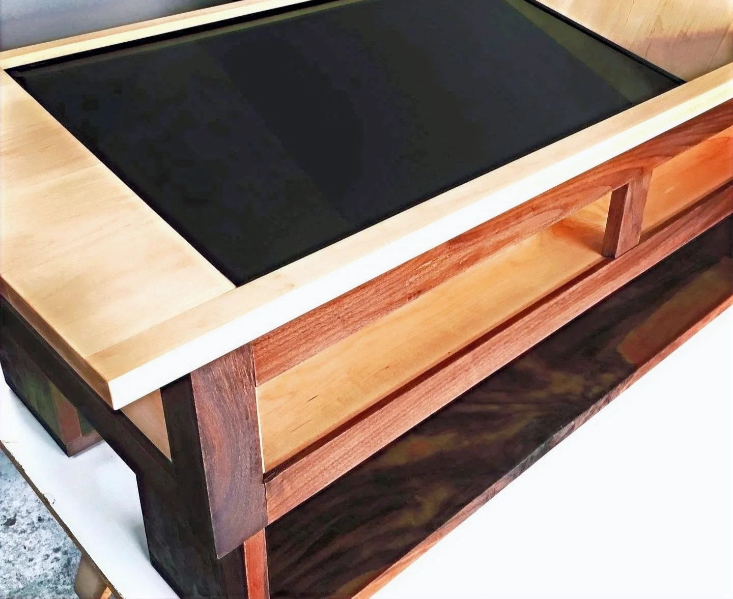 recessed tv in maple and walnut coffee table