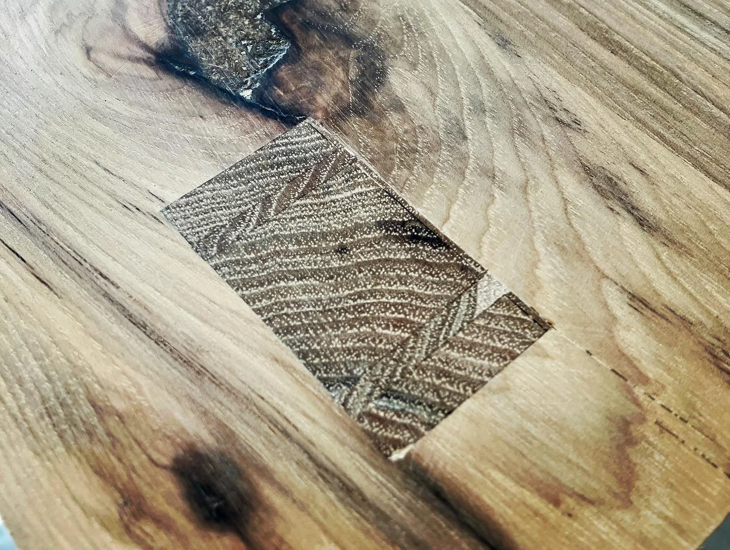 joinery of table leg into the table top