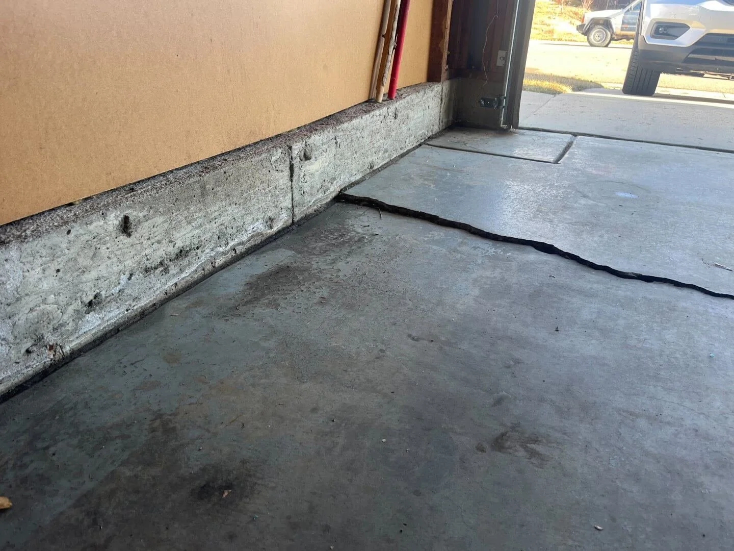 how to fix a sinking driveway,
what causes driveway cracks,
driveway trip hazard repair,
driveway water pooling solutions,
fix driveway drainage issues,
repair broken concrete slab,
driveway settling solutions,
concrete cracks repair near me,