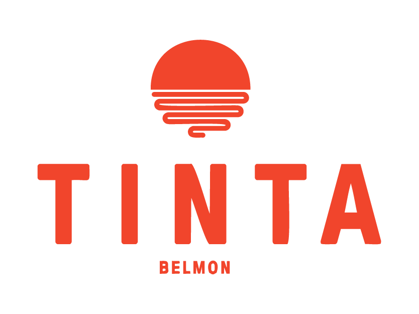 Logo for Tinta Belmont featuring a stylized red sunset or sun with layered lines and the word "TINTA" in large red letters, with "BELMON" in smaller red letters underneath.
