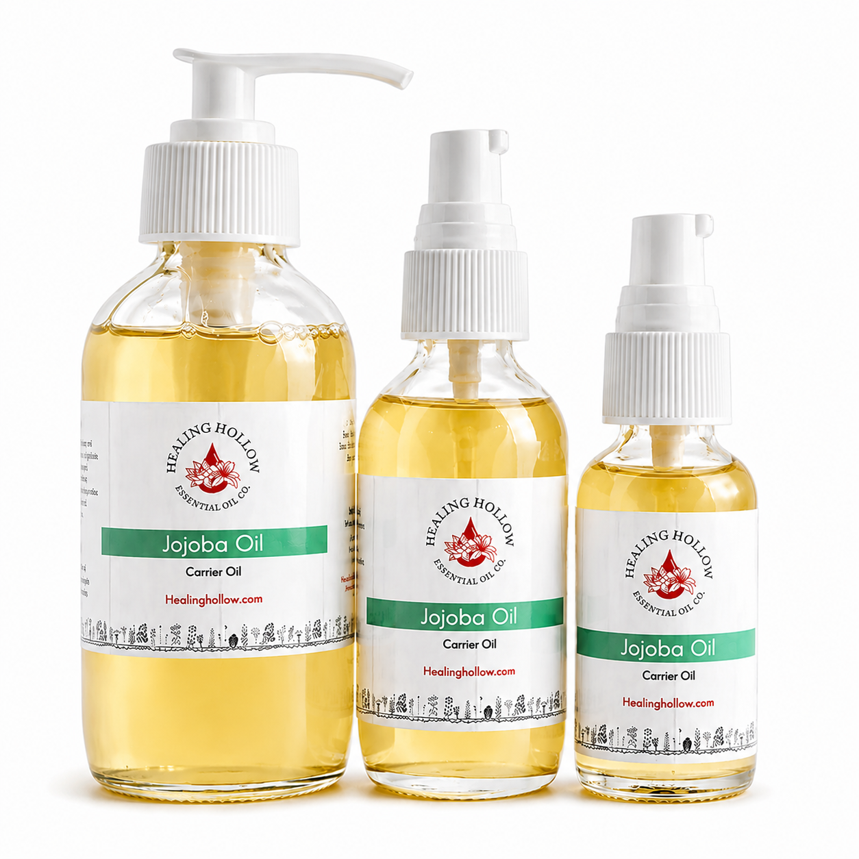 Healing Hollow Jojoba Oil in glass bottles with pump tops on a white background