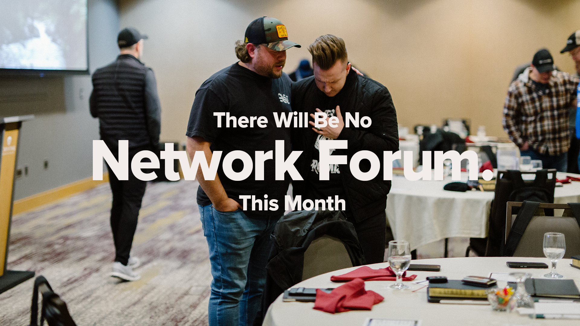 There will be no Network Forum this month. Pastors Praying Together at a table.