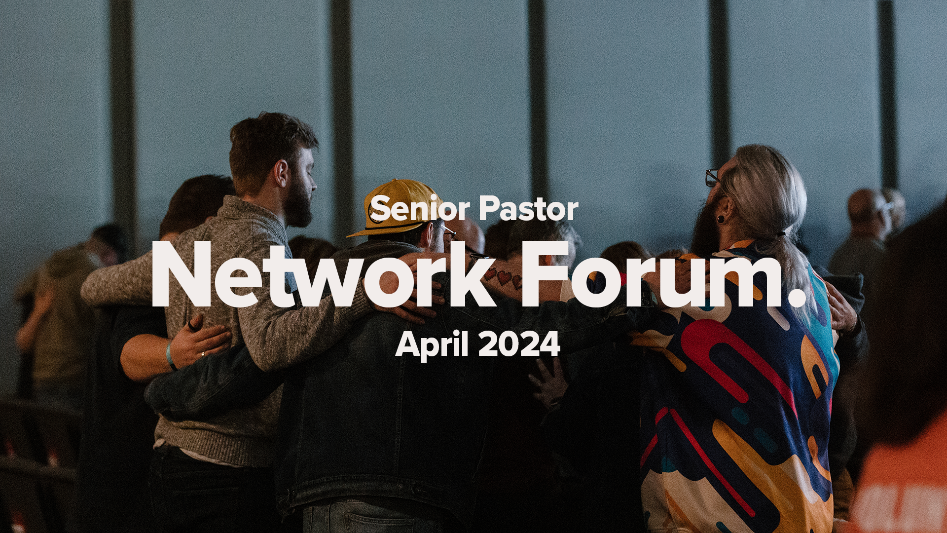 A group of pastors stand with arms together, praying. Promotion for Network Forum April 2024