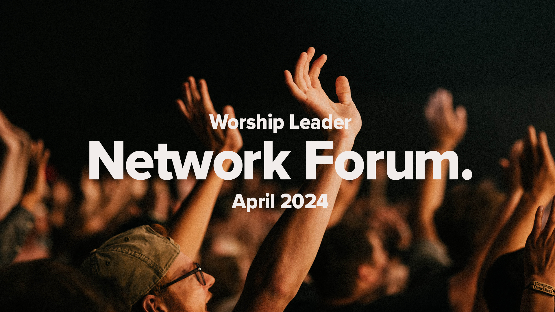 Man has hands raised in worship. Worship Leader Network Forum Promo.