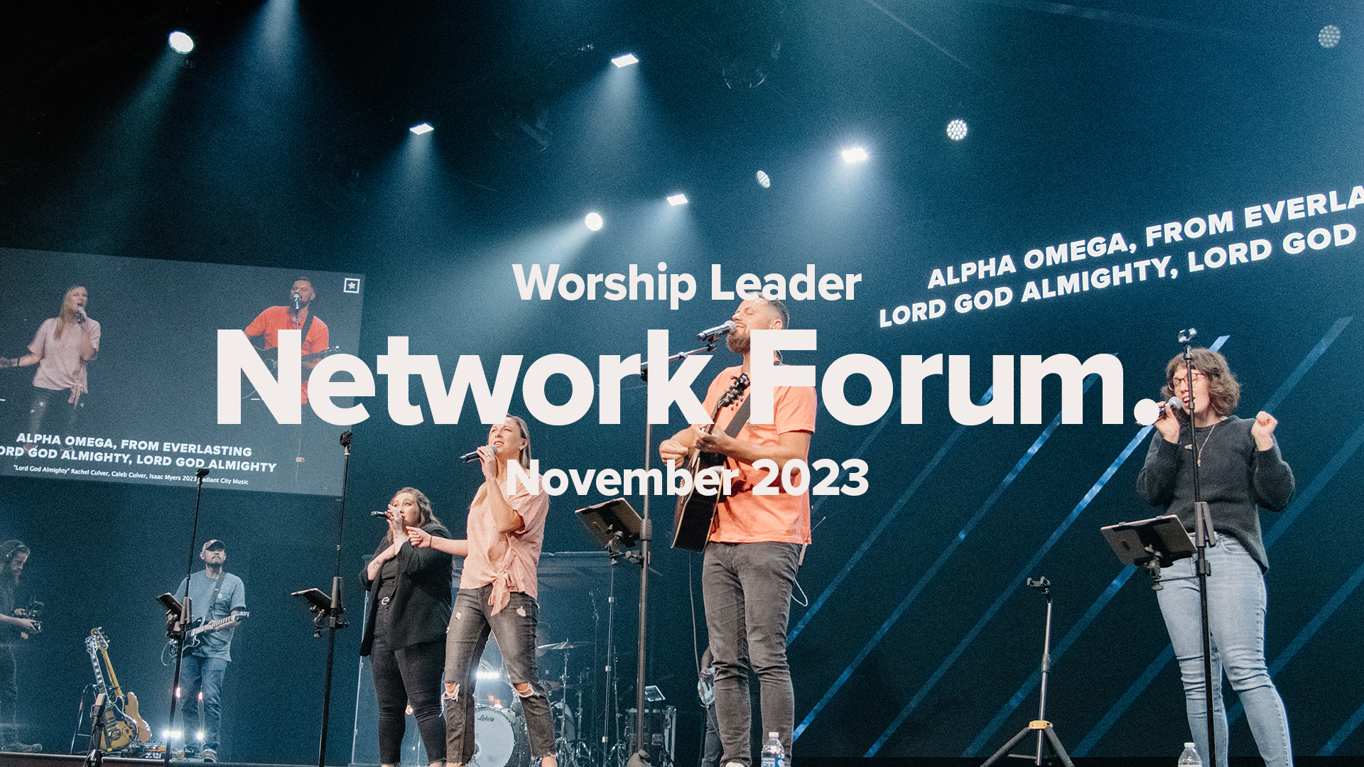 Worship leader on stage leading a song. Worship Leaders Network Forum November 2023